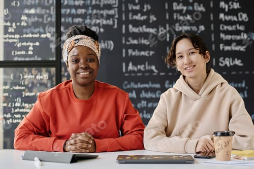 Preview: Teacher and student sitting in the classroom