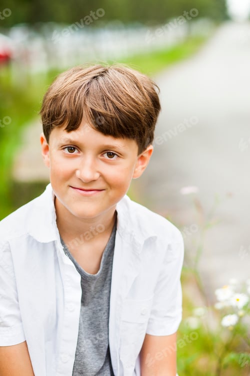 Preview: Portrait of happy pre-adolescent boy