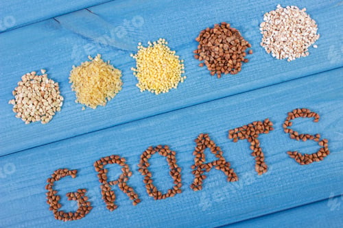 Preview: Inscription groats and various groats on wooden boards, healthy food and nutrition