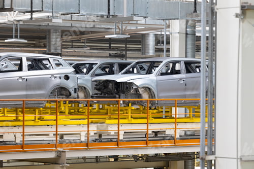 Preview: Photo of automobile production line. Modern car assembly plant. Modern and high-tech automotive