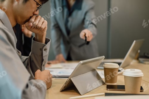 Preview: Upset businessman being scolded by supervisor complaining about work.
