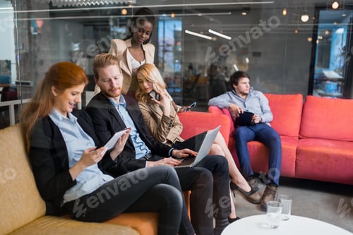 Preview: Business people conversation. Technology at hand