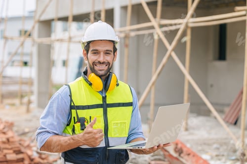 Preview: caucasian latin worker foreman home builder hand sign thumbs up for good pass build and safety
