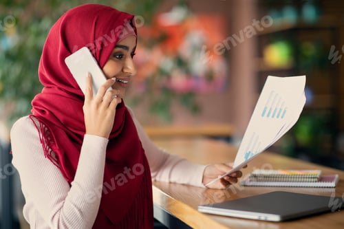Preview: Middle eastern woman personal assistant having phone conversation