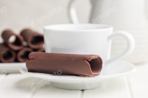 Preview: Chocolate Covered Wafers on White Plate and coffee cup.