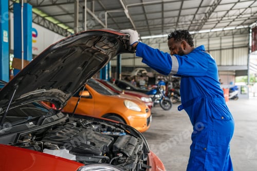 Preview: Auto mechanic in blue uniform are repair and maintenance auto engine is problems.
