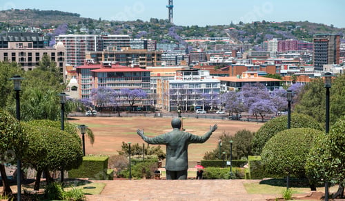 Preview: Nelson Mandela statue rear view and the Union Buildings garden, Pretoria, South Africa.