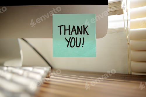 Preview: Words Thank You Written on Sticky Note at Office