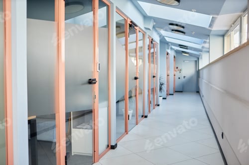 Preview: Corridor with Glass Doors Leading to Individual Rooms in Office Center
