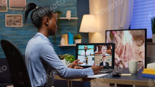 Preview: Black businesswoman on video conference working remotely