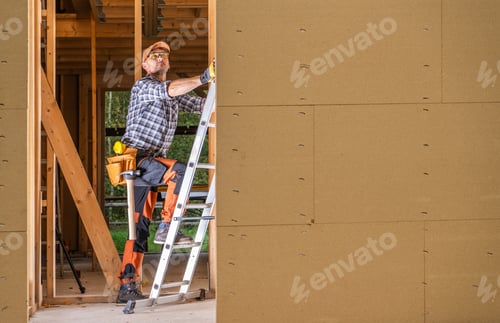 Preview: Contractor Worker Inside Newly Built Wooden House Frame