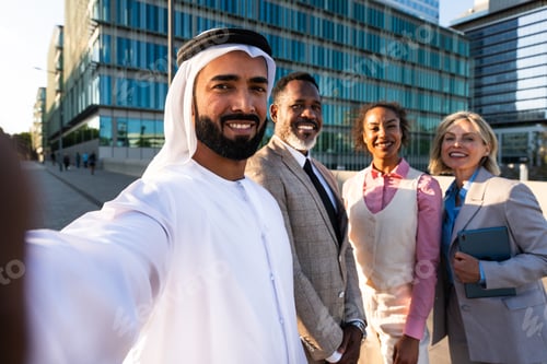 Preview: Group of multiethnic business people meeting an emirati businessman