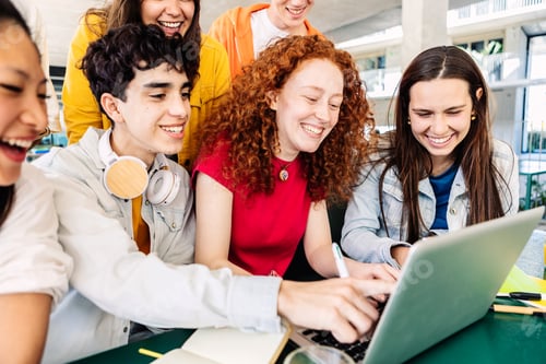 Preview: Young group of student people studying together at college campus