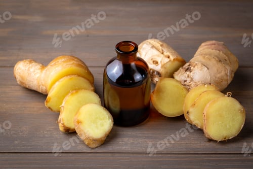 Preview: Ginger essential oil in a small bottle. Selective focus. nature.