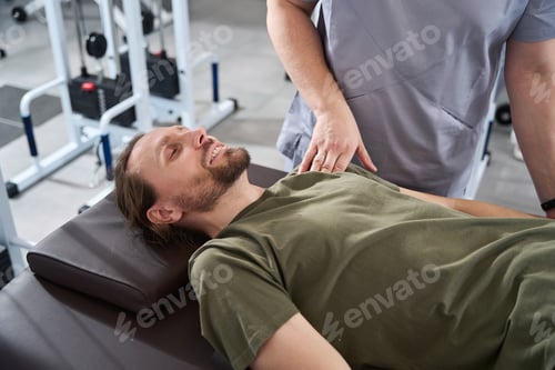 Preview: Military man on a massage table in a rehabilitation center
