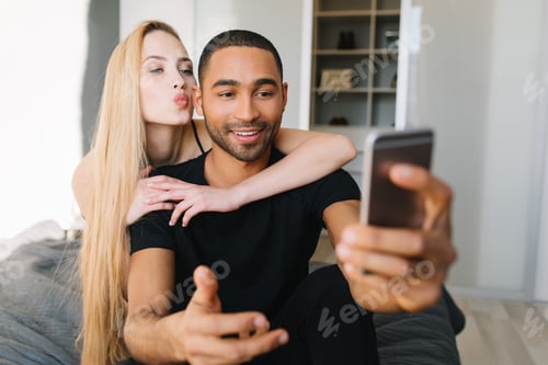 Preview: Lovely couple moments of handsome guy and young pretty woman with long blonde hair having fun, makin