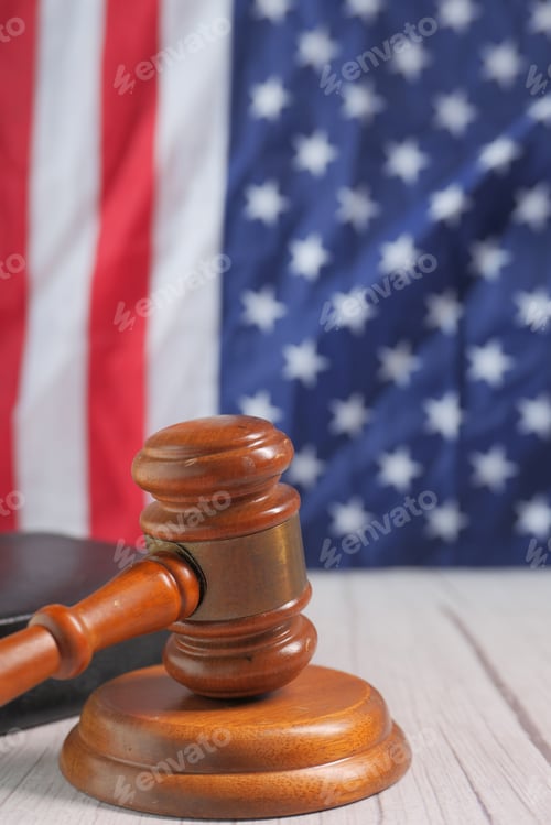 Preview: Closeup of gavel and book against american flag