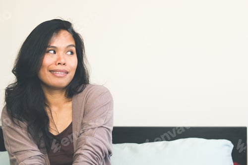 Preview: Woman Smiling and Looking Off to the Side