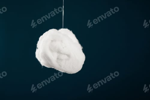 Preview: Closeup shot of a cotton ball isolated on black background