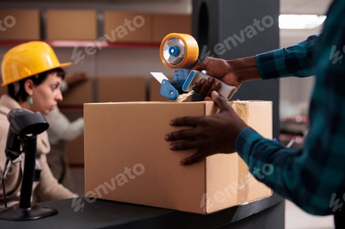 Preview: Factory warehouse worker packing freight for transportation