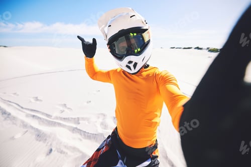 Preview: Motorbike, man and posing for selfie in desert for race challenge, freedom and wellness in action.