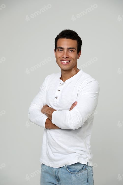 Preview: Handsome young African-American man on light background