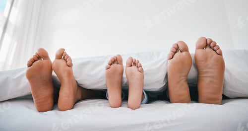 Preview: Sleeping, feet and family in a bed with love, relax and resting in comfort in their home together.