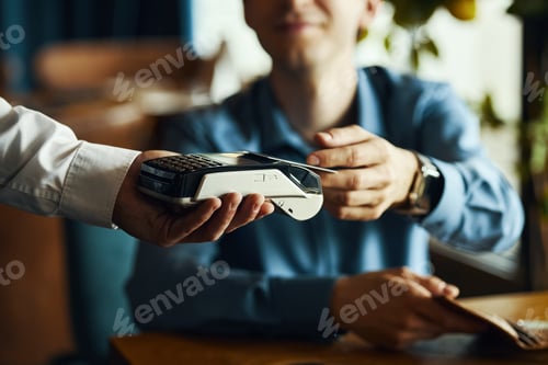 Preview: Caucasian Young Adult Man Making Contactless Payment Using Card Reader