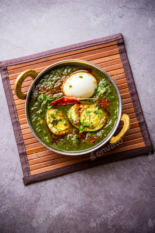 Preview: Spinach egg curry is an Indian non vegetarian dish made using palak gravy with eggs