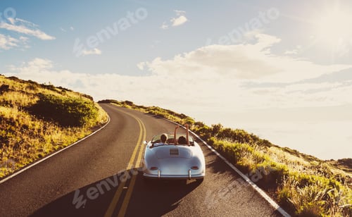 Preview: Coupe Driving on Country Road in Vintage Sports Car