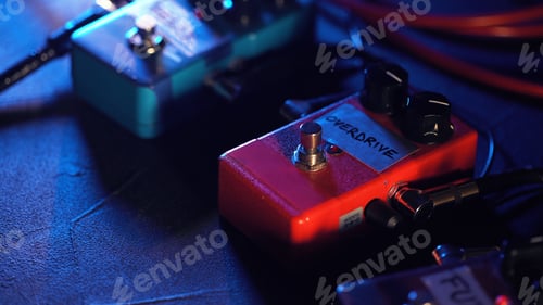 Preview: Close up of guitar pedals. music effect loop machine. Macro view