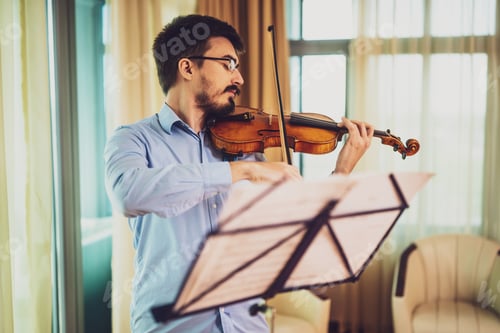 Preview: Man practicing on violin