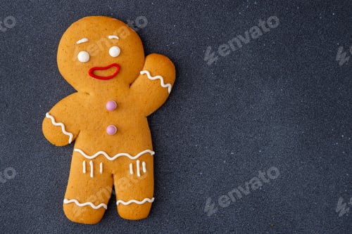 Preview: Gingerbread Man Cookie Figure decorated with icing sugar glaze. Food background. Christmas cookies.