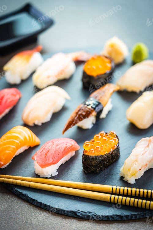 Preview: Nigiri sushi set with salmon tuna shrimp prawn eel shell and oth