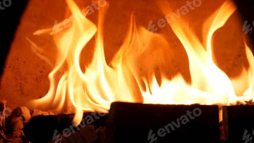 Preview: Close up for burning fire in old fashioned oven for baking food. Frame. Traditional oven, burning