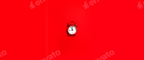 Preview: Red retro alarm clock on red background with copy space. Top view. Flat lay