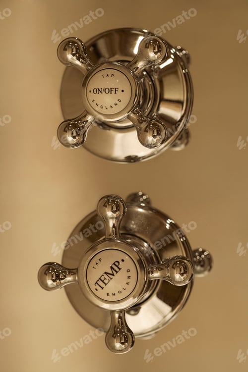 Preview: Close up of shower faucet handles