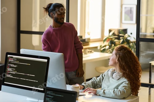 Preview: Programmers discussing codes for new software