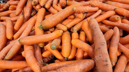 Preview: Closeup fresh orange carrot, soft selective focus. Background with carrot.vegetable