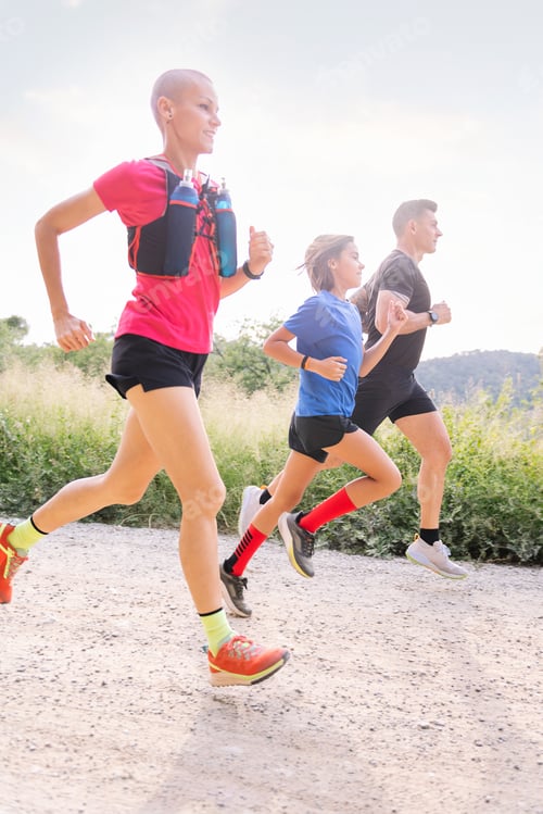 Preview: family practicing trail running in the countryside