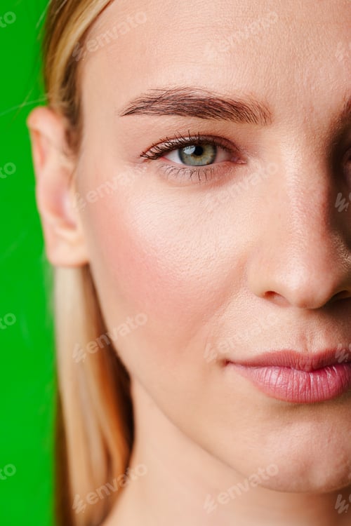Preview: Close Up Portrait of Woman With Green Background