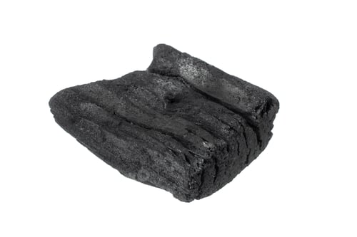 Preview: pieces of charcoal on a white isolated background
