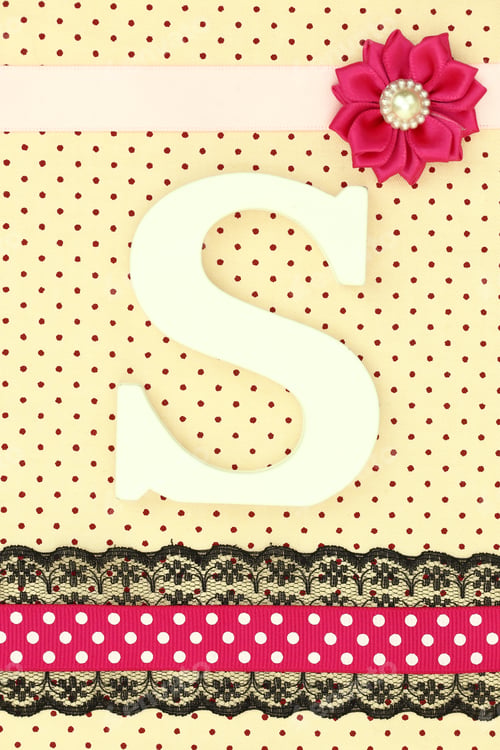 Preview: Wooden letter S on polka dots background