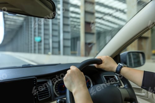 Preview: People driving car on city road