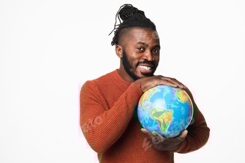 Preview: Happy cheerful african-american young man traveler hugging holding embracing Earth globe