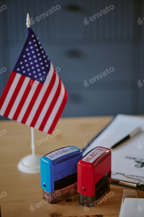 Preview: American Flag Displayed with Stamps and Clipboard on Desk