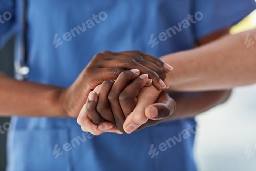 Preview: Never lose hope. Closeup shot of a medical practitioner holding a patients hand in comfort.