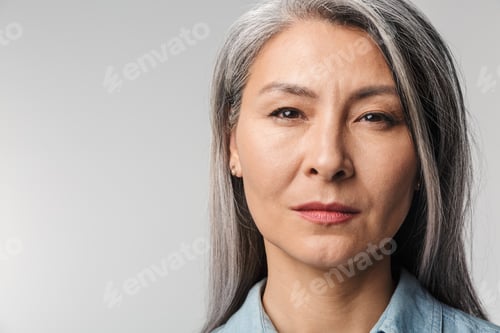 Preview: Image of adult mature woman with long white hair looking at camera