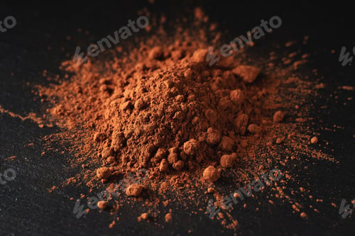 Preview: A slide of cocoa powder on a dark background