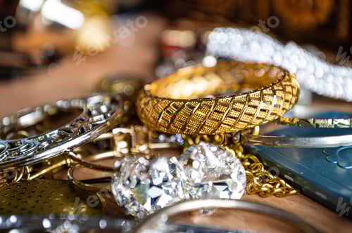 Preview: closeup of beautiful costume jewelry, earrings, beads, bracelets and rings
